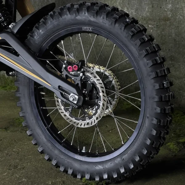 The 18" rear wheel is mounted on a Talaria e-bike with OFF-ROAD tires.