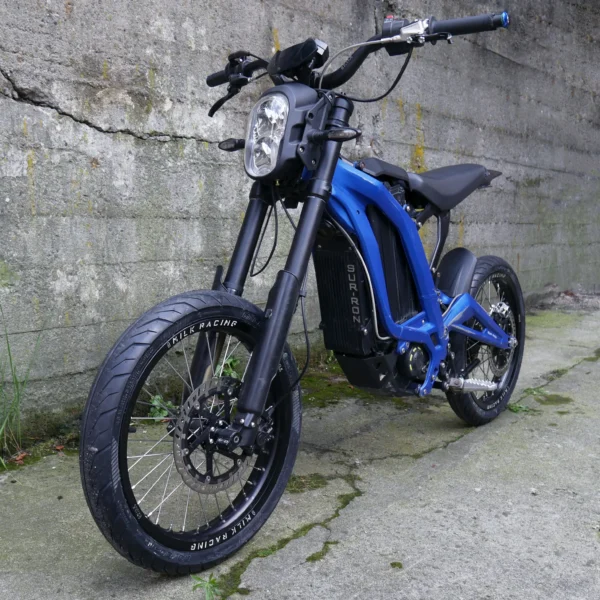 The 16” Supermoto Superlight Set is mounted on a Surron e-bike with ON-ROAD tires.