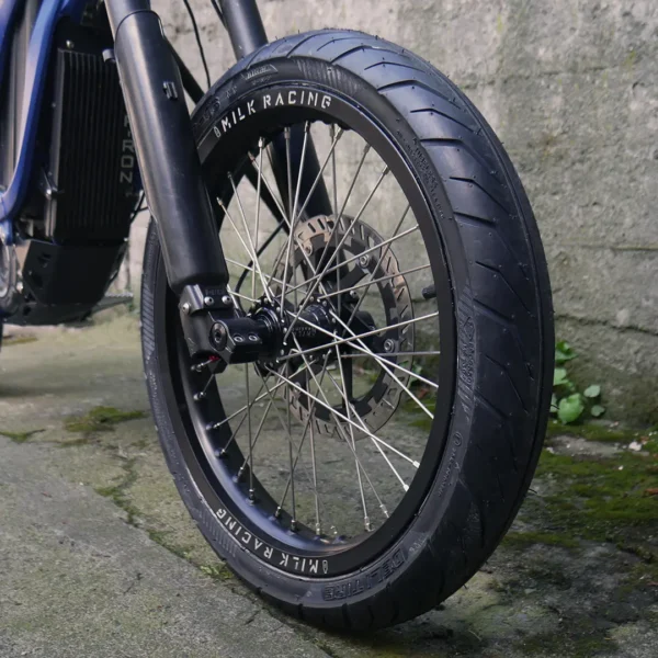 The 16” Supermoto Superlight Set is mounted on a Surron e-bike with ON-ROAD tires.