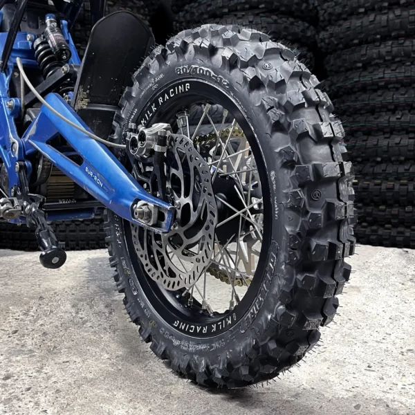 The 12” Kid Set is mounted on a Surron e-bike with OFF-ROAD tires.