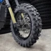 The 12” Kid Set is mounted on a Surron e-bike with OFF-ROAD tires.