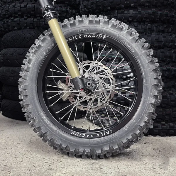 The 14” PitBike Set is mounted on a Surron e-bike with OFF-ROAD tires.