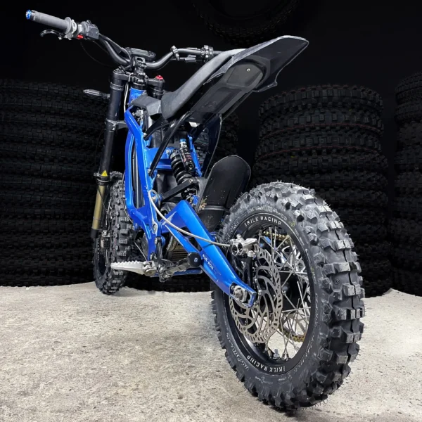 The 16” &amp; 14” PitBike Set is mounted on a Surron e-bike with OFF-ROAD tires.