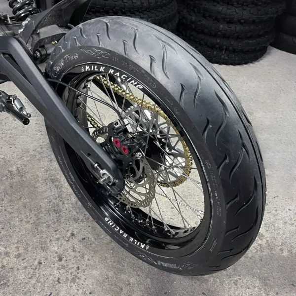 The 17" SuperMoto rear wheel is mounted on a Talaria e-bike with ON-ROAD tires.